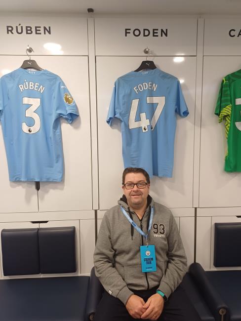 Huw in the Man City changing room at The Etihad